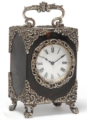 Lot 1341 - A Victorian Silver Mounted Tortoiseshell Travelling Clock, London 1897, the tortoiseshell case with