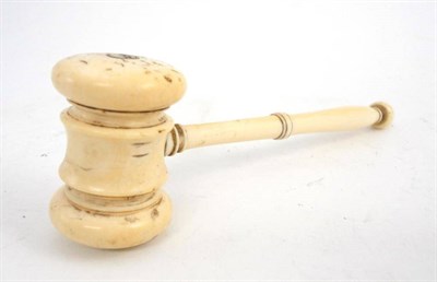 Lot 1359 - An Early 20th Century Ivory Gavel, the slender turned handle with acorn knop, 14cm long