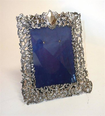 Lot 1403 - A Victorian Silver Photograph Frame, marker's mark WC, London 1887, the pierced and repousse...