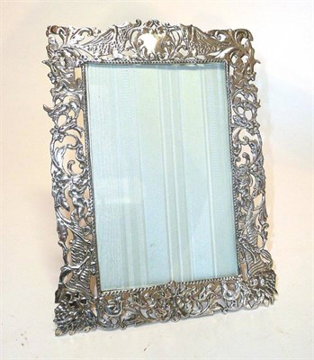 Lot 1404 - A Victorian Silver Photograph Frame, marker's mark JB, London 1890, the pierced and repousse...