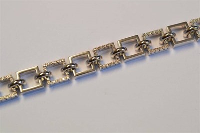 Lot 1196A - A Diamond Bracelet, open squares alternate between plain polished white links and diamond set...