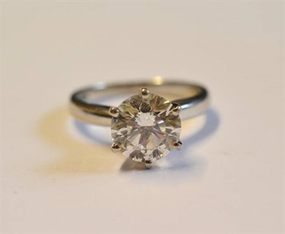 Lot 1244A - A Platinum Diamond Solitaire Ring, the round brilliant cut diamond held in a six claw Tiffany...