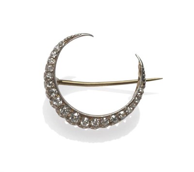 Lot 1005 - A Diamond Crescent Brooch, circa 1880, the crescent set with graduated old cut diamonds in...