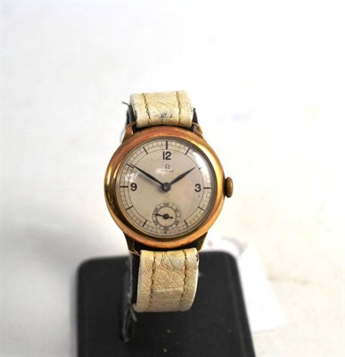 Lot 1018 - A 9ct Gold Wristwatch, signed Omega, 1936, lever movement numbered 8400161, silvered dial with...