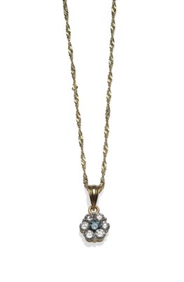 Lot 1019 - A Blue and White Diamond Cluster Pendant, en suite to the previous lot, a round brilliant cut...