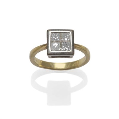 Lot 1031 - An 18 Carat Gold Princess Cut Diamond Cluster Ring, the four diamonds tension set within a...