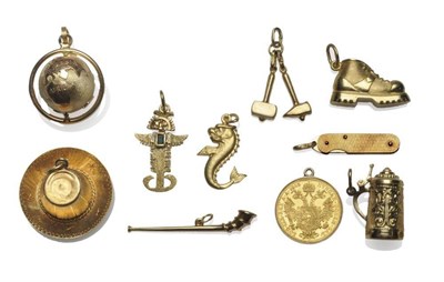 Lot 1032 - Ten Charms, including a pipe, a boot, a penknife, a hat, and an Austrian coin
