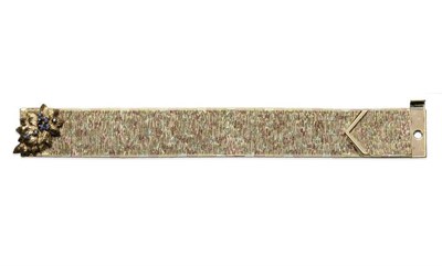 Lot 1033 - A 9 Carat Three Colour Gold Bracelet, of textured brick link form, with an applied floral spray set