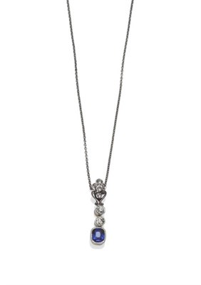 Lot 1038 - A Sapphire and Diamond Pendant on Chain, a diamond set floral cluster suspends two old cut diamonds
