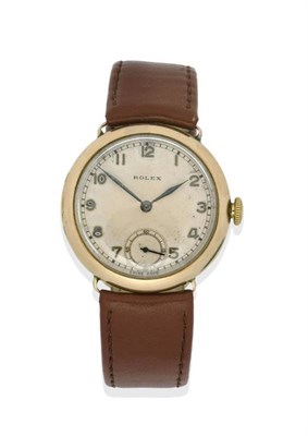 Lot 1039 - A 9ct Gold Wristwatch, signed Rolex, 1928, lever movement, silvered dial with applied Arabic...