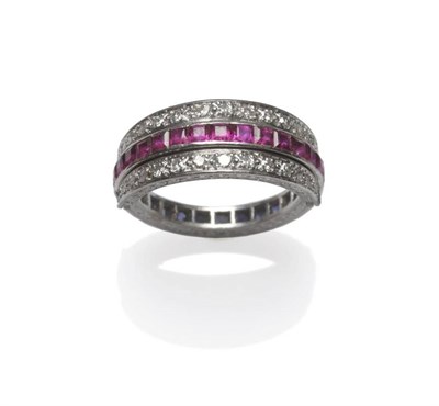 Lot 1041 - An Early 20th Century Ruby, Sapphire and Diamond Eternity 'Flip' Ring, a full eternity ring...