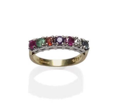 Lot 1049 - An 18 Carat Gold 'REGARDS' Ring, round brilliant cut stones in sequence; ruby, emerald, garnet,...