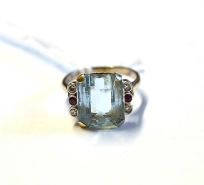 Lot 1054 - A 9 Carat White Gold Aquamarine Ring, the emerald cut aquamarine in a four claw setting, with a...