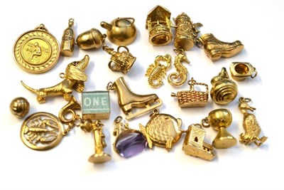 Lot 1057 - Twenty-Five Charms, including a skating boot, a bowling medal, a kettle, a dachshund, a church...