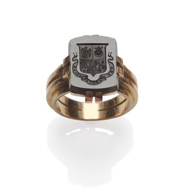 Lot 1067 - A French Intaglio Ring, an oblong onyx with crest intaglio, in rose coloured broad claws, on a...