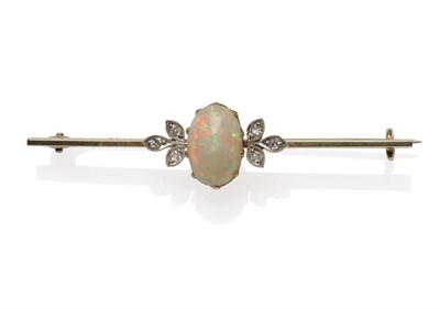 Lot 1090 - An Opal and Diamond Bar Brooch, the oval cabochon opal flanked by a trefoil of old single cut...
