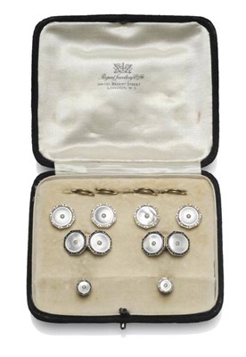 Lot 1108 - A Dress Stud and Cufflink Set, mother-of-pearl disks inset with split pearl type stones, within...