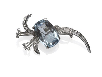 Lot 1111 - An Aquamarine and Diamond Brooch, of spray form, with a cushion shaped aquamarine centrally,...