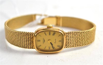 Lot 1125 - A Lady's 9ct Gold Wristwatch, signed Longines, circa 1980, quartz movement, gilt dial with...