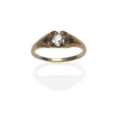 Lot 1147 - A Diamond Solitaire Ring, the old cut diamond in a yellow six claw setting, shoulders tapering to a