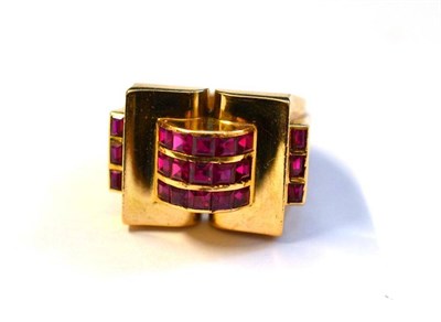 Lot 1156 - An Art Deco Style Ruby Ring, set with step cut rubies, finger size P