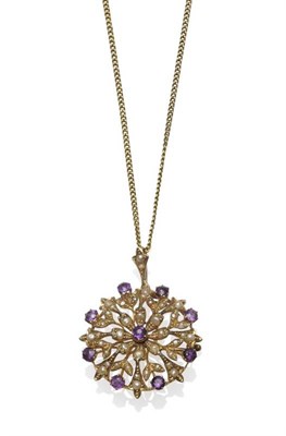 Lot 1164 - An Amethyst and Seed Pearl Brooch/Pendant on Chain, of stylised floral form, with detachable...