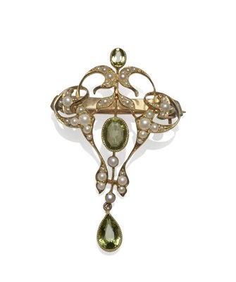 Lot 1167 - A Peridot and Seed Pearl Brooch, of typical Edwardian form, measures 3.2cm by 4.8cm