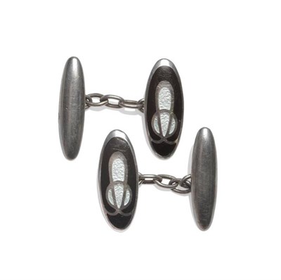 Lot 1169 - A Pair of Cufflinks, by Charles Horner, chain linked oval panels, one in polished silver, the other