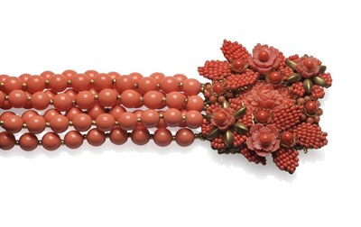 Lot 1173 - A Faux Coral Bracelet, in the style of Stanley Hagler, seven rows of beads create a broad bracelet