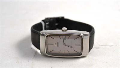 Lot 1194 - A Stainless Steel Automatic Calendar Wristwatch, signed Omega, model: De Ville, circa 1970,...