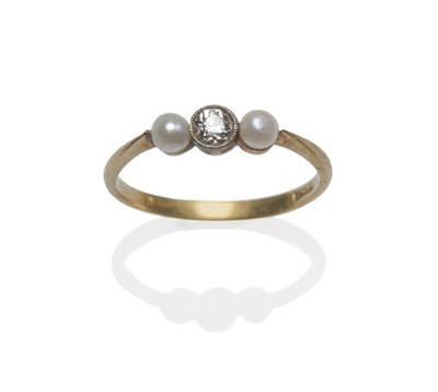 Lot 1205 - A Diamond and Pearl Three Stone Ring, the old cut diamond in a white fronted millegrain setting...