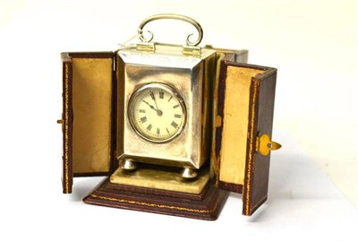 Lot 1301 - A George V Silver Travelling Clock, Elkington and Co., Birmingham 1912, rectangular with...