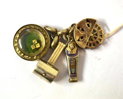 Lot 1315 - Four Novelty White Metal Watch Fobs, comprising a waterwheel with rotating wheel, a gaming fob...