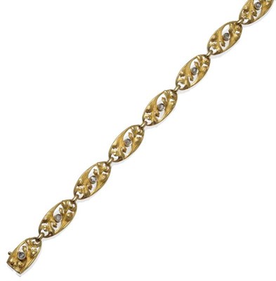 Lot 1018 - A French Gold and Diamond Bracelet, of oval links in a foliate design, each centred with a rose cut