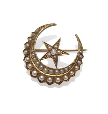 Lot 1027 - A Star and Crescent Brooch, circa 1880, the star sits within the curve of the crescent, the...