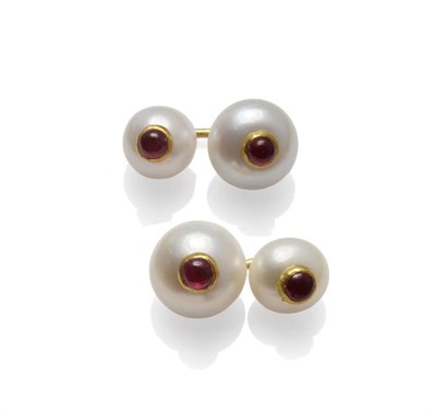 Lot 1048 - A Pair of Cultured Pearl and Ruby Cufflinks, each bar linked cultured pearl inset with a...