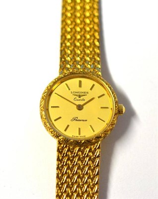 Lot 1053 - A Lady's 9ct Gold Wristwatch, signed Longines, model: Presence, circa 1980, quartz movement,...