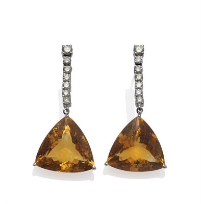 Lot 1062 - A Pair of 18 Carat White Gold Citrine and Diamond Drop Earrings, a row of round brilliant cut...