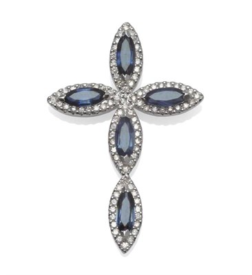 Lot 1075 - An 18 Carat White Gold Sapphire and Diamond Cross Pendant, five marquise cut sapphires within...