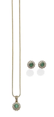 Lot 1081 - A Pair of 18 Carat Gold Emerald and Diamond Earrings, a round brilliant cut emerald within a border