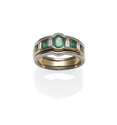 Lot 1086 - An Emerald and Diamond Ring, the oval cut emerald centres the alternating baguette cut diamonds and