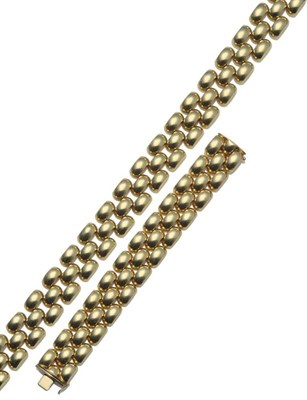 Lot 1088 - A Necklace, by Birks, of three rows of domed brick links, length 45cm, width 2.3cm, and A Bracelet