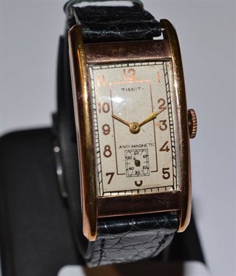 Lot 1105 - An Art Deco Curved Steel and Gold Plated Wristwatch, signed Tissot, anti-magnetic, lever...