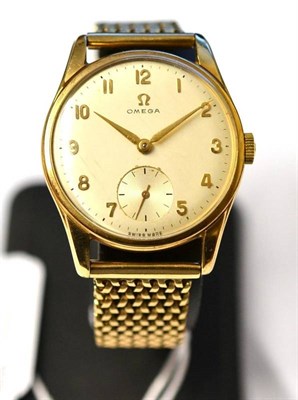 Lot 1122 - A 9ct Gold Wristwatch, signed Omega, 1958, (calibre 267) lever movement numbered 16827385, silvered