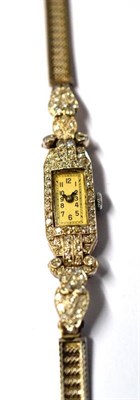 Lot 1127 - A Lady's Art Deco Diamond Set Wristwatch, lever movement, silvered dial with Arabic numerals,...