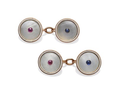 Lot 1130 - A Pair of Ruby and Sapphire Set Cufflinks, the mother-of-pearl chain linked disks within white...