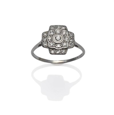 Lot 1142 - An Art Deco Diamond Cluster Ring, the round brilliant cut and eight-cut diamonds in a white...