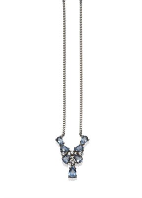 Lot 1147 - An 18 Carat White Gold Aquamarine and Diamond Necklace, a cluster of pear cut aquamarines and round