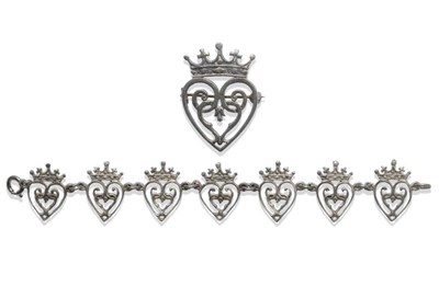 Lot 1176 - A Scottish Silver Brooch, a heart motif surmounted by a coronet, measures 3.2cm by 4.4cm, A...