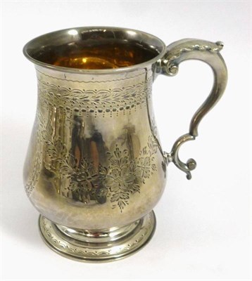 Lot 1191 - A George II Silver Mug, maker's mark JW, London 1753, of typical baluster form with scroll...